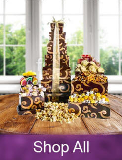 Gift towers filled with chocolate, snacks and treats in stackable keepsake boxes